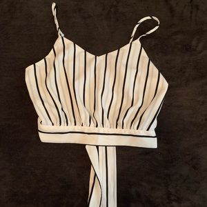 Cropped, lightweight open back tank top.